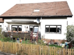 Südansicht - Komplett frei in ruhiger Grünlage über BAD LIEBENZELL! Großzügiges 2-FAMILIEN-HAUS mit großem Garten und Doppelgarage in MAISENBACH-ZAINEN