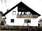 Westansicht - Komplett frei in ruhiger Grünlage über BAD LIEBENZELL! Großzügiges 2-FAMILIEN-HAUS mit großem Garten und Doppelgarage in MAISENBACH-ZAINEN