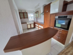 Theke vor offener EBK - Jede Menge Platz & Komfort, Baujahr 2001! 4-ZIMMER-WOHNUNG mit großem Balkon & Einbauküche in WALDENBUCH!